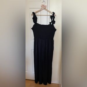 Black Ruffle Trim Smocked Pocket Jumpsuit